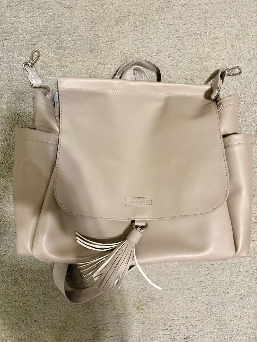 485- Skip Hop Beige Faux-Leather Diaper Backpack with Tassel